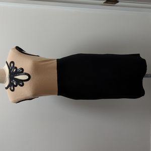 Tory Burch black and tan sweater dress.